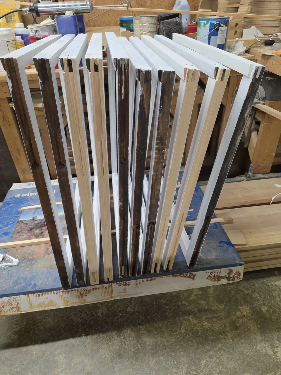 New wood spliced alongside an original member during repair.