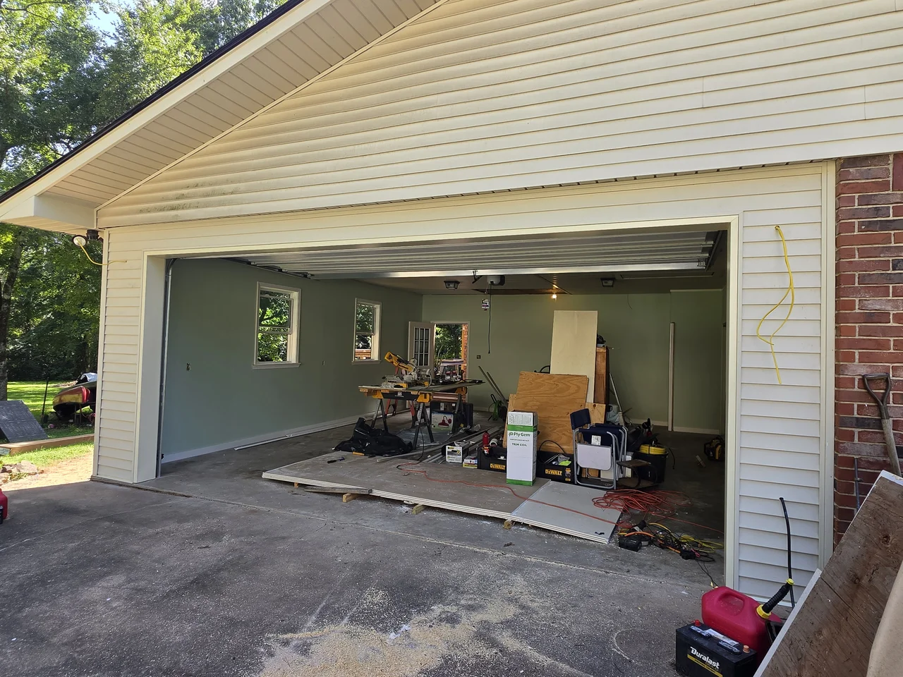 The completed garage opening showing the finished interior beyond.