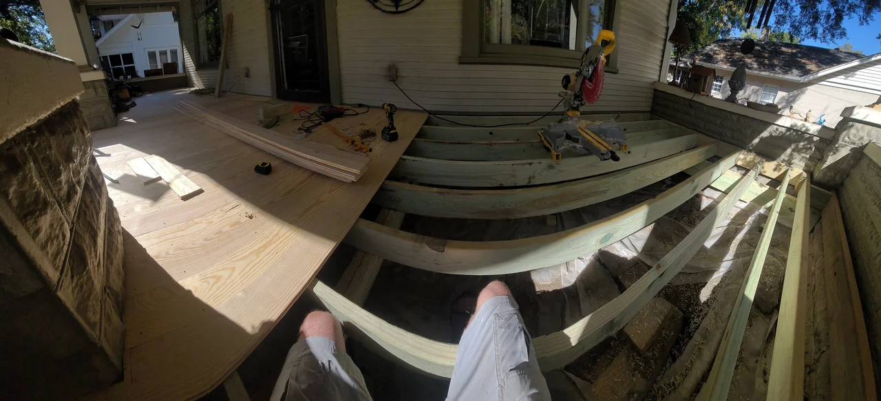 The porch floor joists set in place during the rebuild.