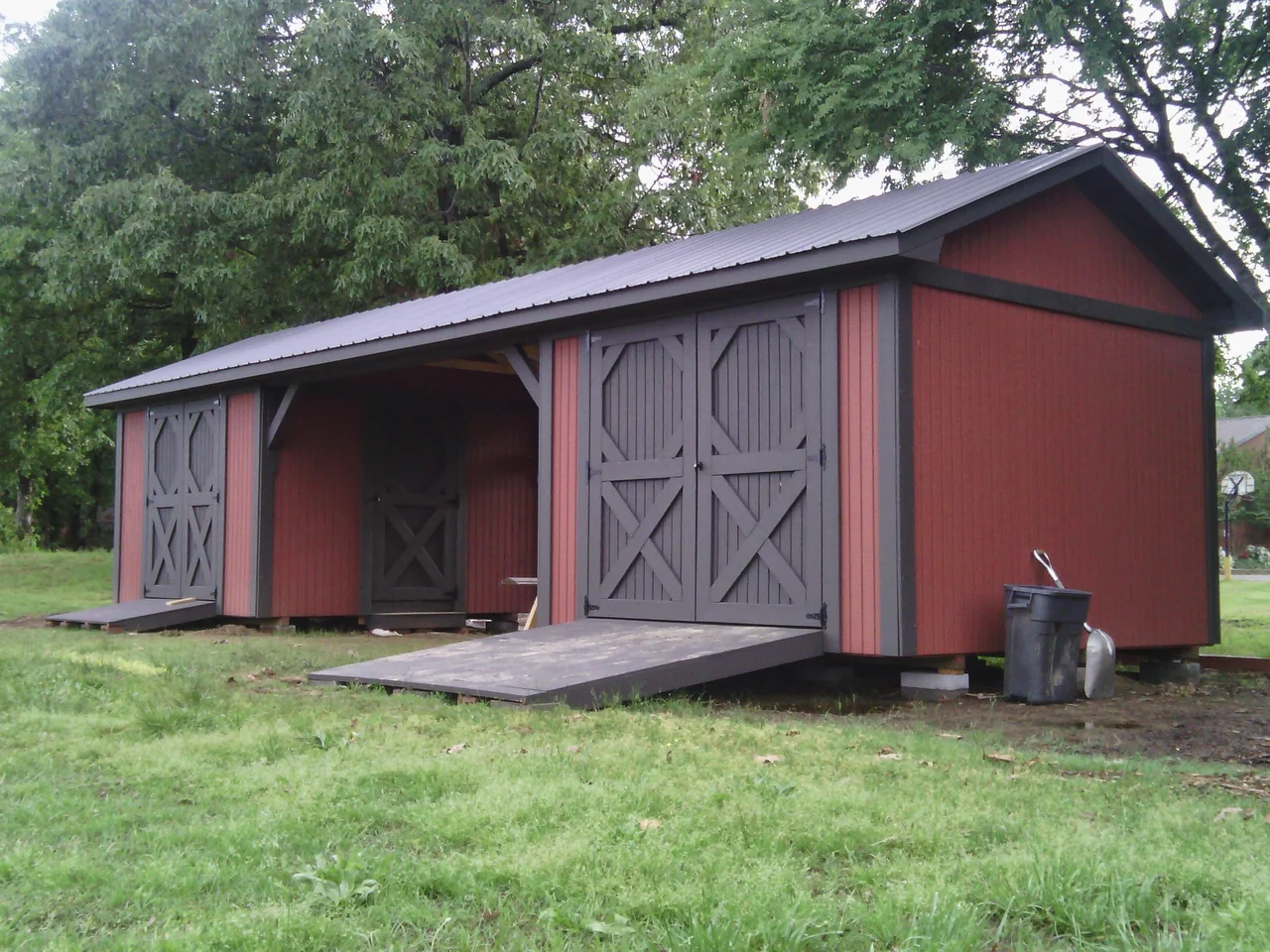 The finished shed showing both bays and the open central breezeway.