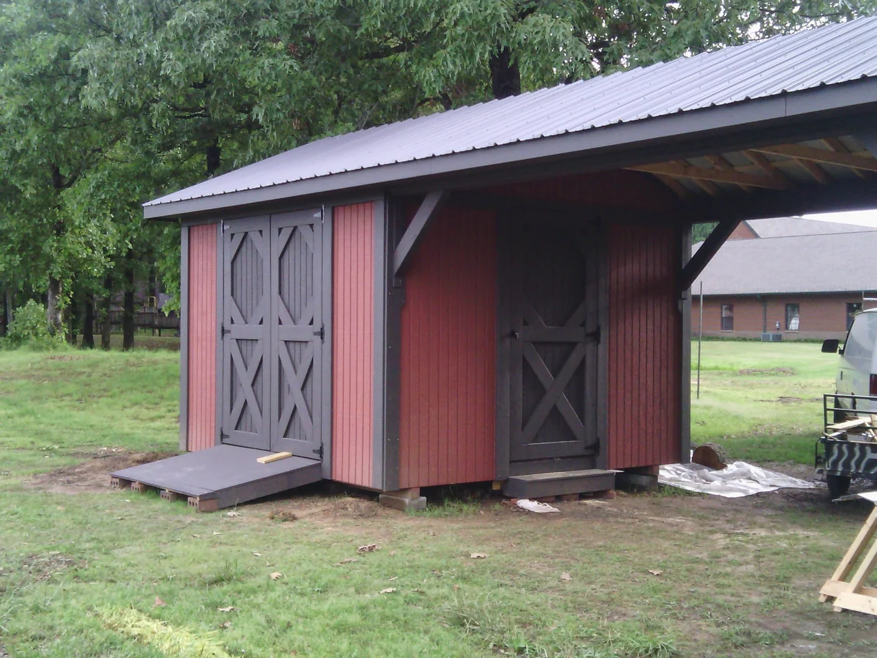 An angled view through the open covered breezeway between the two bays.