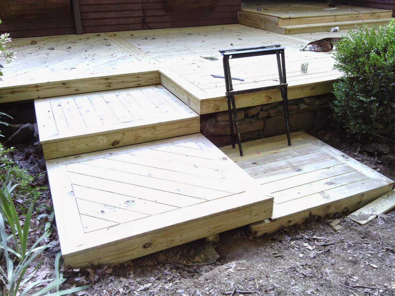 The finished mitred step landing at the deck edge.