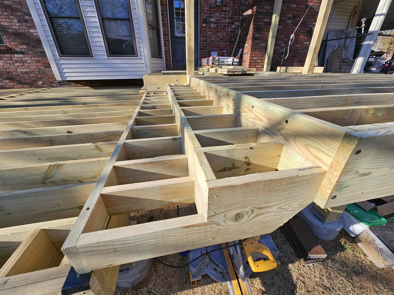 Deck joists with diagonal blocking installed before decking.