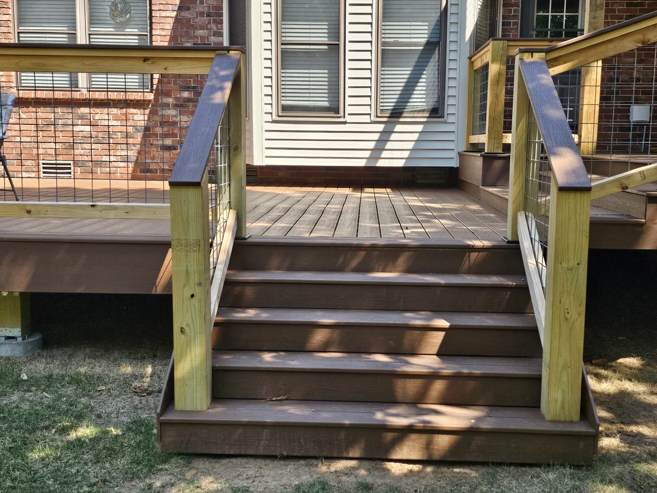 Deck stair treads with the railing termination detail.