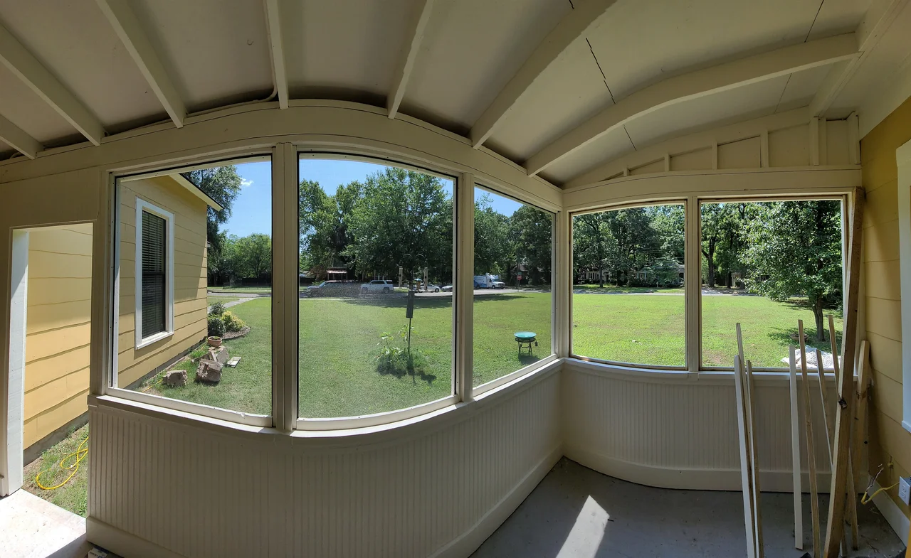 The finished porch interior with glazing on three sides.