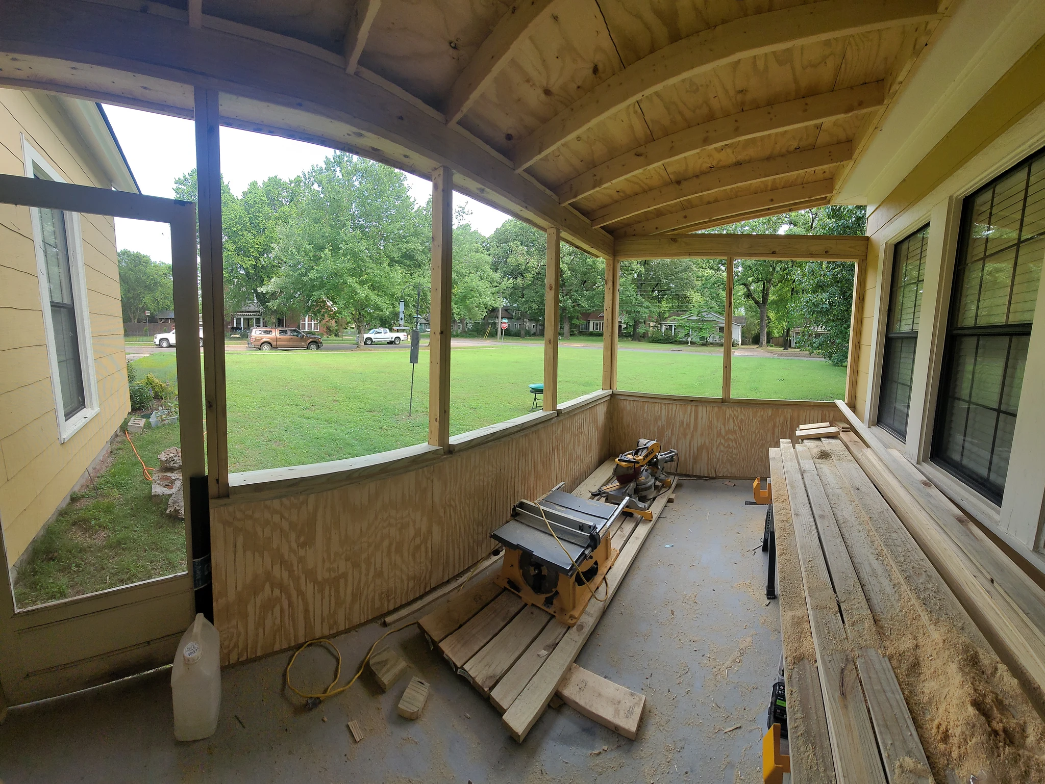 Interior view of the porch ceiling framing under construction.