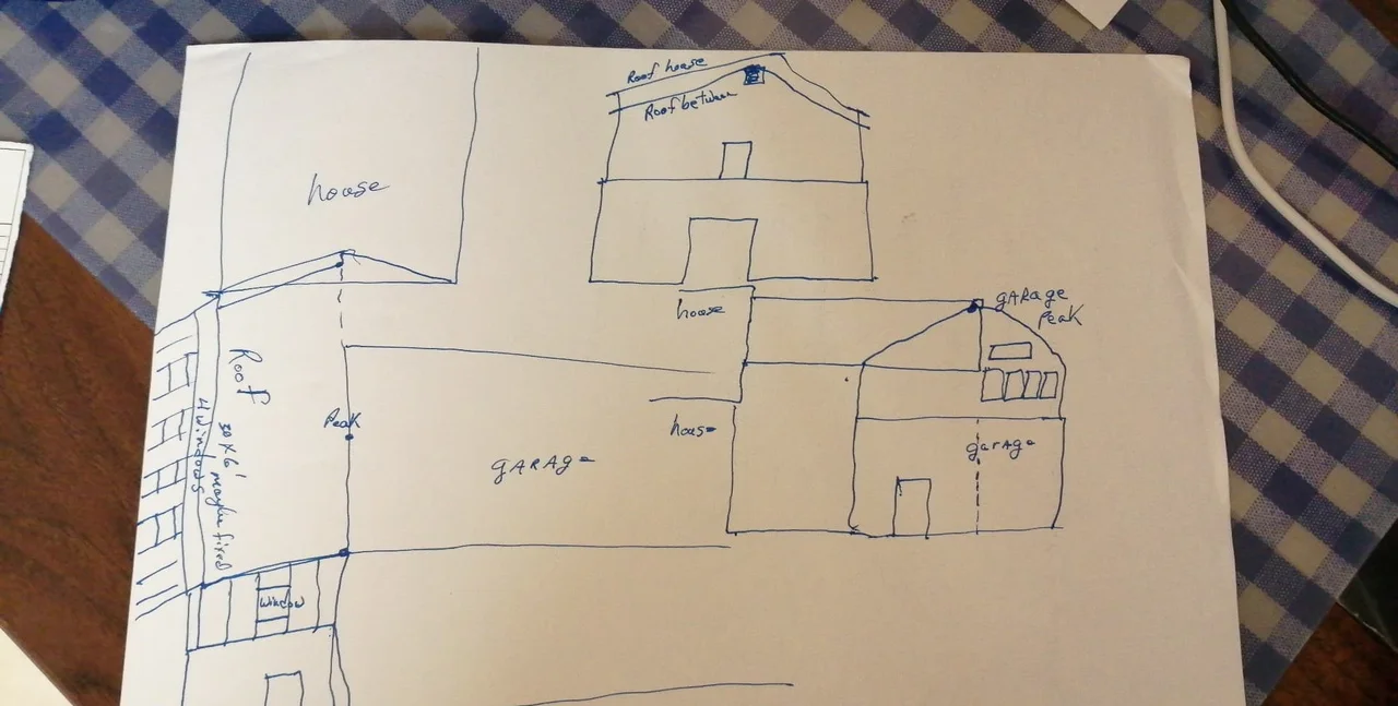 A hand-drawn floor plan sketched in pencil on notebook paper.