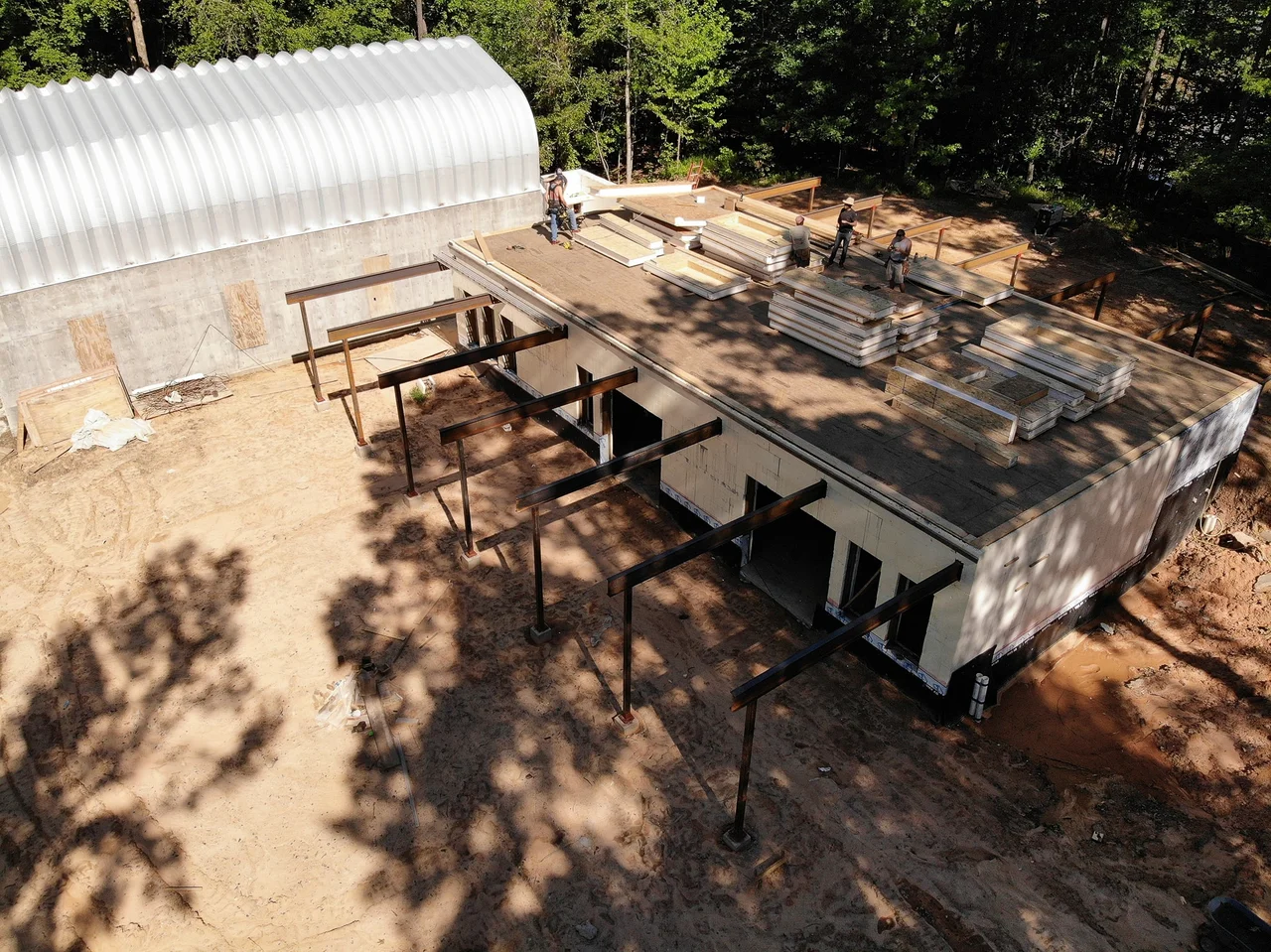 Aerial view of the poured concrete deck with steel posts set.