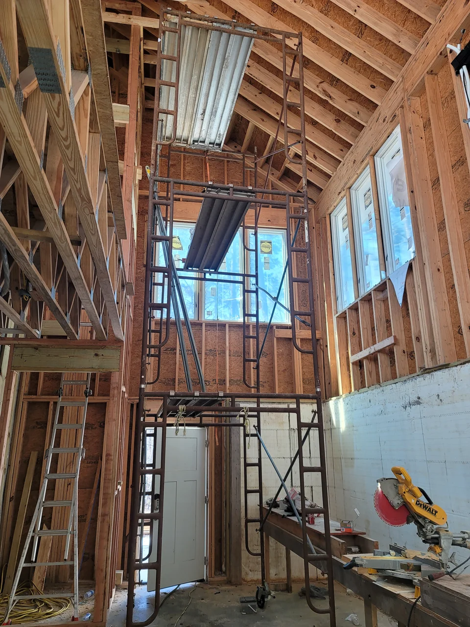 Interior of the tall framed volume with scaffolding in place.